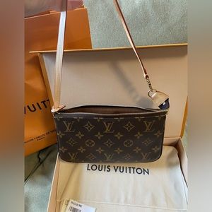 Louis Vuitton small bag.